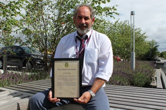 Gordon is honoured for his Scouts work